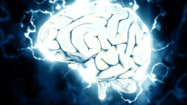 Cerebro luminiscente sobre fondo oscuro