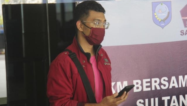 COVID-19 positive man from Indonesia boards flight disguised as wife; gets arrested