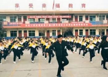 Watch: Chinese school principal breaks into 'shuffle dance' to get students into exercise routine