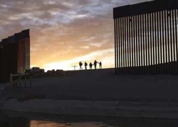 Are US border policies behind the spike in COVID-19 infection rates across the country?