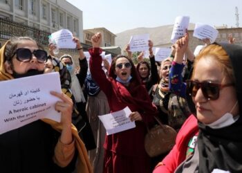 'Don't want to turn the clock back': Taliban allows women to study, but conditions apply