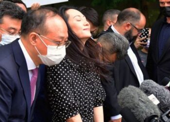 Huawei CFO Meng Wanzhou flies back to China after striking deal with US