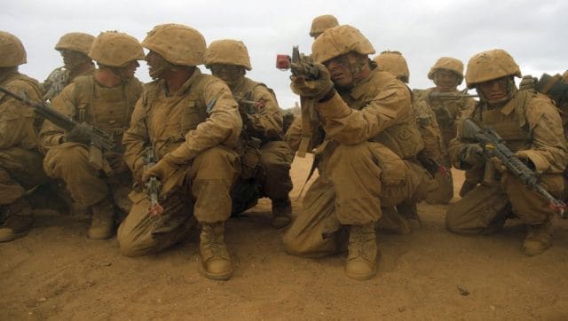 US Marines: A 'few good men' who pay the heavy price of keeping the US flag flying